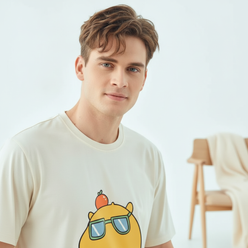 Close-up portrait of Silas Reed, a man smiling, wearing the CARTUNE pure cotton pajama top against a clean, bright white back